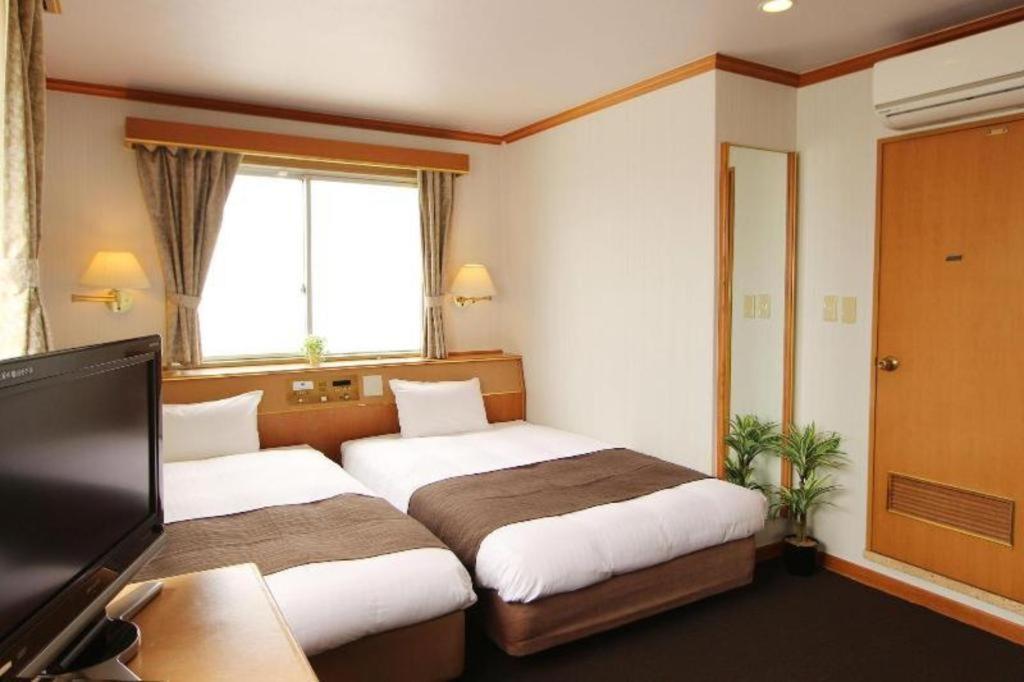Hotel Livemax Budget Naha Tomarikou Esterno foto